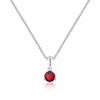 Silver necklace with a red gemstone pendant on a white background
