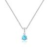 Silver necklace with a blue gemstone pendant on a white background