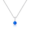 Silver necklace with a blue gemstone pendant on a white background